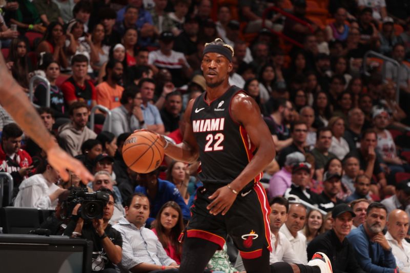 MIAMI, FL - NOVEMBER 4:  Jimmy Butler #22 of the Miami Heat dribbles the ball during the game against the Sacramento Kings during a regular season game on November 4, 2024 at Kaseya Center in Miami, Florida. NOTE TO USER: User expressly acknowledges and agrees that, by downloading and or using this Photograph, user is consenting to the terms and conditions of the Getty Images License Agreement. Mandatory Copyright Notice: Copyright 2024 NBAE (Photo by Issac Baldizon/NBAE via Getty Images)