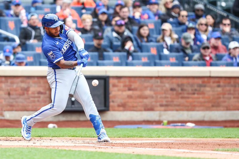 Apr 13, 2024; New York City, New York, USA;  Kansas City Royals designated hitter Nelson Velázquez (17) hits an RBI single in the first inning against the New York Mets at Citi Field. Mandatory Credit: Wendell Cruz-USA TODAY Sports