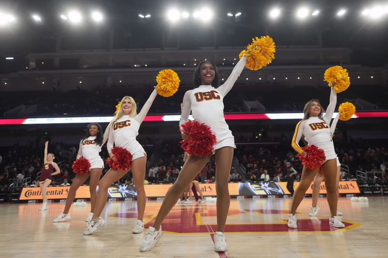 Jan 14, 2025; Los Angeles, California, USA; Southern California Trojans song girls cheerleaders perform during the game against the Iowa Hawkeyes at the Galen Center. Mandatory Credit: Kirby Lee-Imagn Images