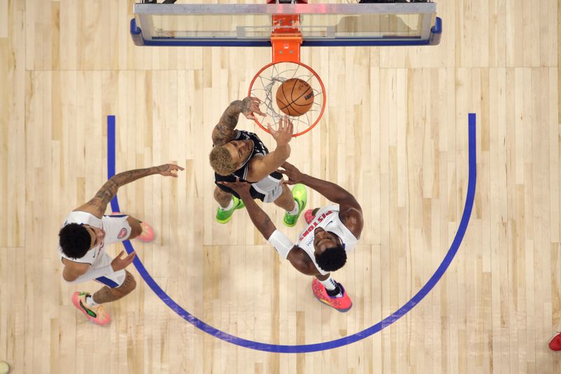 DETROIT, MI - JANUARY 10:  Jeremy Sochan #10 of the San Antonio Spurs dunks the ball during the game against the Detroit Pistons on January 10, 2024 at Little Caesars Arena in Detroit, Michigan. NOTE TO USER: User expressly acknowledges and agrees that, by downloading and/or using this photograph, User is consenting to the terms and conditions of the Getty Images License Agreement. Mandatory Copyright Notice: Copyright 2024 NBAE (Photo by Brian Sevald/NBAE via Getty Images)