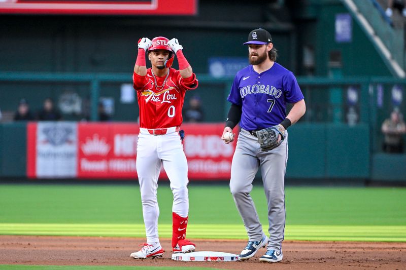 Jun 7, 2024; St. Louis, Missouri, USA;  St. Louis Cardinals shortstop Masyn Winn (0) reacts after hitting a double against the Colorado Rockies during the first inning at Busch Stadium. Mandatory Credit: Jeff Curry-USA TODAY Sports