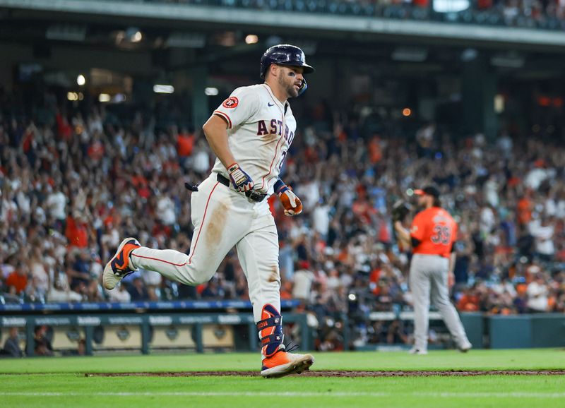 Jun 22, 2024; Houston, Texas, USA; Baltimore Orioles starting pitcher Corbin Burnes (39) reacts and Houston Astros right fielder Chas McCormick (20) rounds the bases after hitting a home run during the fifth inning at Minute Maid Park. Mandatory Credit: Troy Taormina-USA TODAY Sports