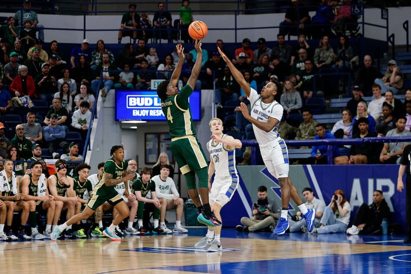 Mar 9, 2024; Colorado Springs, Colorado, USA; Colorado State Rams guard Isaiah Stevens (4) attempts a shot under pressure from Air Force Falcons guard Ethan Taylor (5) in the second half at Clune Arena. Mandatory Credit: Isaiah J. Downing-USA TODAY Sports