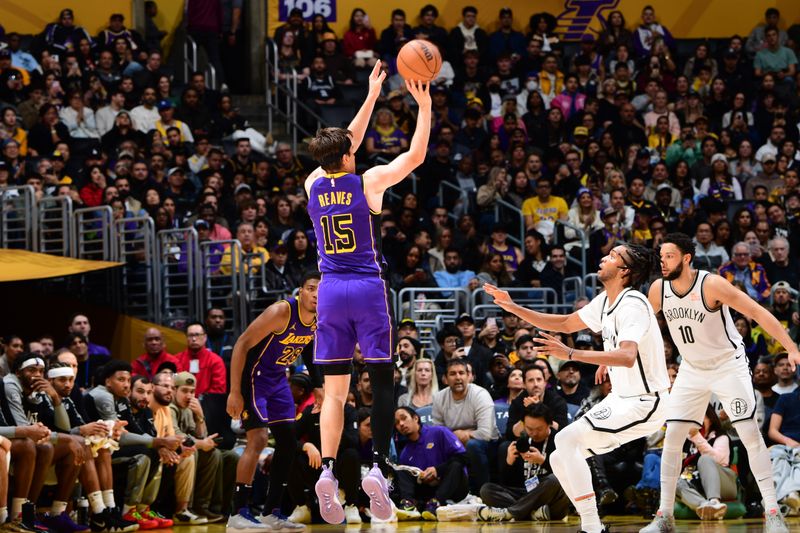 LOS ANGELES, CA - JANUARY 17: Austin Reaves #15 of the Los Angeles Lakers shoots the ball during the game against the Brooklyn Nets on January 17, 2025 at Crypto.Com Arena in Los Angeles, California. NOTE TO USER: User expressly acknowledges and agrees that, by downloading and/or using this Photograph, user is consenting to the terms and conditions of the Getty Images License Agreement. Mandatory Copyright Notice: Copyright 2025 NBAE (Photo by Adam Pantozzi/NBAE via Getty Images)