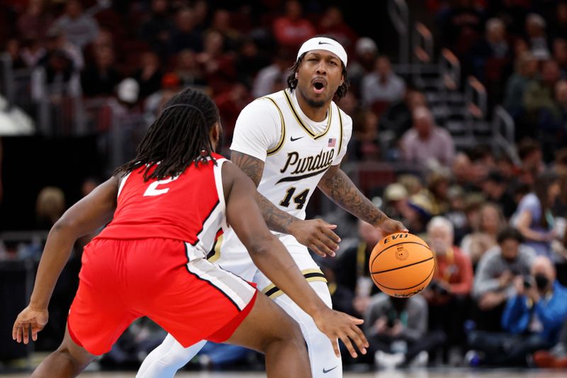 Mar 11, 2023; Chicago, IL, USA; Purdue Boilermakers guard David Jenkins Jr. (14) brings the ball up court against Ohio State Buckeyes guard Bruce Thornton (2) during the second half at United Center. Mandatory Credit: Kamil Krzaczynski-USA TODAY Sports