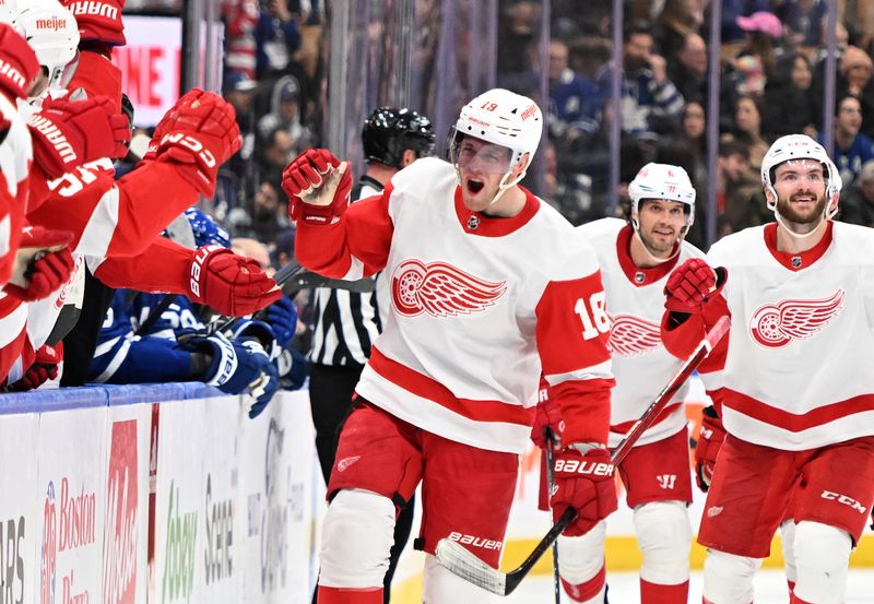 Jan 14, 2024; Toronto, Ontario, CAN;  Detroit Red Wings forward Andrew Copp (18) celebrates after scoring against the Toronto Maple Leafs in the third period at Scotiabank Arena. Mandatory Credit: Dan Hamilton-USA TODAY Sports