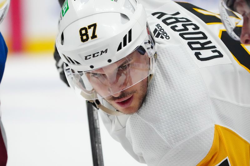 Mar 24, 2024; Denver, Colorado, USA; Pittsburgh Penguins center Sidney Crosby (87) awaits a face off in third period against the Colorado Avalanche at Ball Arena. Mandatory Credit: Ron Chenoy-USA TODAY Sports