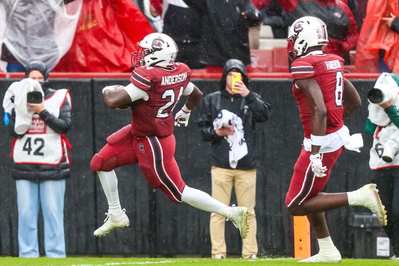 Nov 11, 2023; Columbia, South Carolina, USA; South Carolina Gamecocks running back Mario Anderson (24) runs for a 72-yard touchdown against the Vanderbilt Commodores in the second half at Williams-Brice Stadium. Mandatory Credit: Jeff Blake-USA TODAY Sports