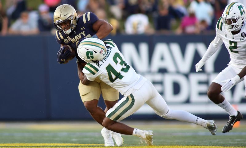 Oct 19, 2024; Annapolis, Maryland, USA; Charlotte 49ers defensive back Randy Franklin (43) takes down Navy Midshipmen fullback Daba Fofana (45) during the second half at Navy-Marine Corps Memorial Stadium. Mandatory Credit: Daniel Kucin Jr.-Imagn Images