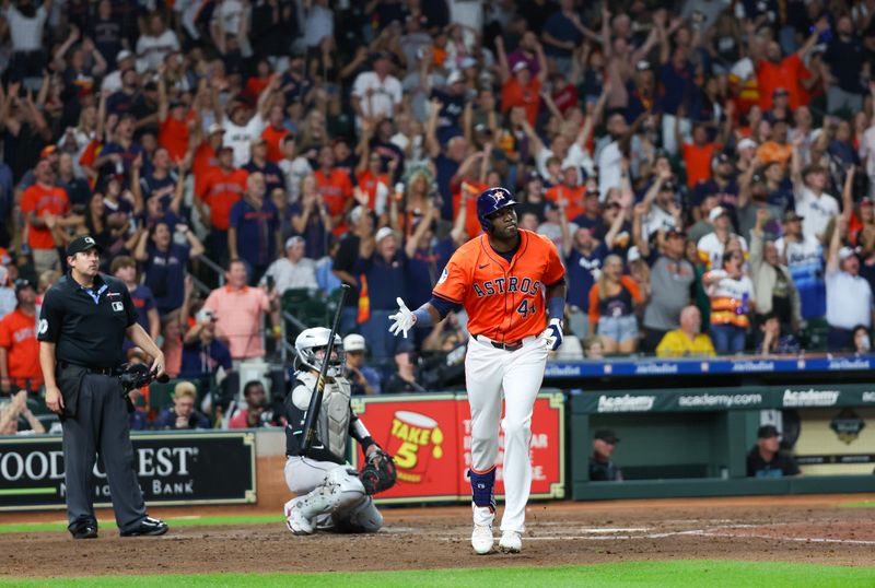 Sep 6, 2024; Houston, Texas, USA; Houston Astros left fielder Jordan Alvarez (44) hits a three run home run against the Arizona Diamondbacks in the fifth inning at Minute Maid Park. Mandatory Credit: Thomas Shea-Imagn Images