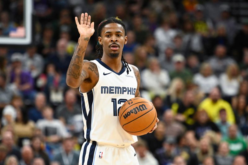 SALT LAKE CITY, UTAH - OCTOBER 23: Ja Morant #12 of the Memphis Grizzlies reacts during the third quarter against the Utah Jazz at Delta Center on October 23, 2024 in Salt Lake City, Utah. NOTE TO USER: User expressly acknowledges and agrees that, by downloading and or using this photograph, User is consenting to the terms and conditions of the Getty Images License Agreement. (Photo by Alex Goodlett/Getty Images)