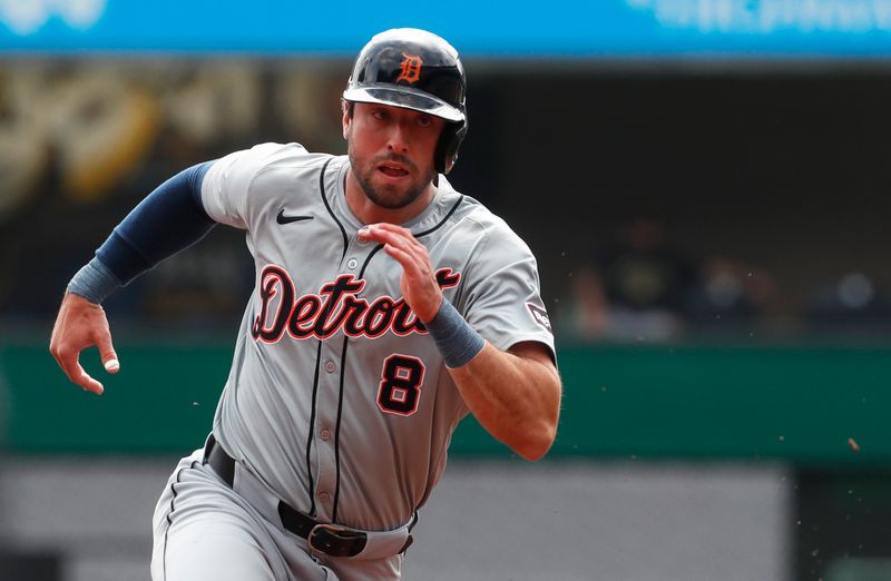 Apr 9, 2024; Pittsburgh, Pennsylvania, USA;  Detroit Tigers center fielder Matt Vierling (8) runs from first base to third base against the Pittsburgh Pirates during the first inning at PNC Park. Mandatory Credit: Charles LeClaire-USA TODAY Sports