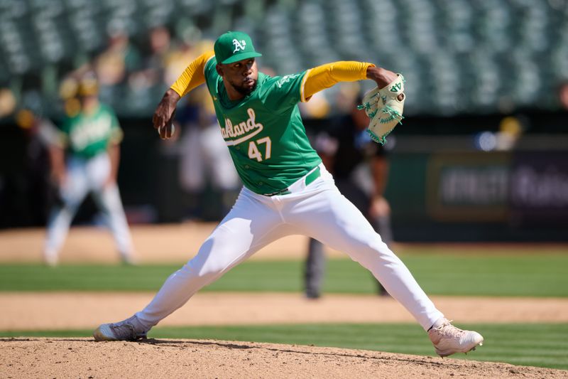 Aug 24, 2024; Oakland, California, USA; Oakland Athletics pitcher Michel Otanez (47) throws a pitch against the Milwaukee Brewers during the ninth inning at Oakland-Alameda County Coliseum. Mandatory Credit: Robert Edwards-USA TODAY Sports