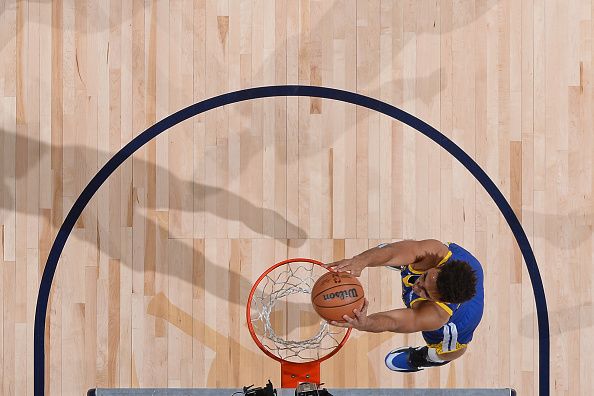 DENVER, CO - DECEMBER 25: Trayce Jackson-Davis #32 of the Golden State Warriors dunks the ball during the game against the Denver Nuggets on December 25, 2023 at the Ball Arena in Denver, Colorado. NOTE TO USER: User expressly acknowledges and agrees that, by downloading and/or using this Photograph, user is consenting to the terms and conditions of the Getty Images License Agreement. Mandatory Copyright Notice: Copyright 2023 NBAE (Photo by Bart Young/NBAE via Getty Images)