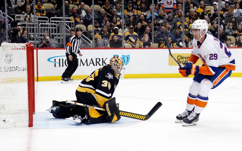 Mar 9, 2023; Pittsburgh, Pennsylvania, USA; New York Islanders center Brock Nelson (29) reacts after scoring the game winning goal n overtime against the Pittsburgh Penguins at PPG Paints Arena. The Islanders won 4-3 in overtime. Mandatory Credit: Charles LeClaire-USA TODAY Sports