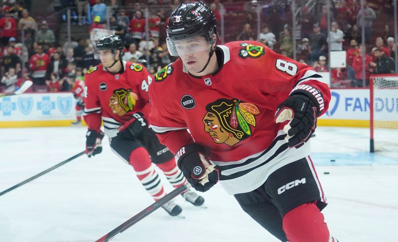 Oct 24, 2023; Chicago, Illinois, USA; Chicago Blackhawks center Ryan Donato (8) warms up before the game against the Boston Bruins at United Center. Mandatory Credit: David Banks-USA TODAY Sports