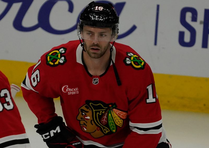 Oct 25, 2024; Chicago, Illinois, USA; Chicago Blackhawks center Jason Dickinson (16) warms up before a game against the Nashville Predators at United Center. Mandatory Credit: David Banks-Imagn Images