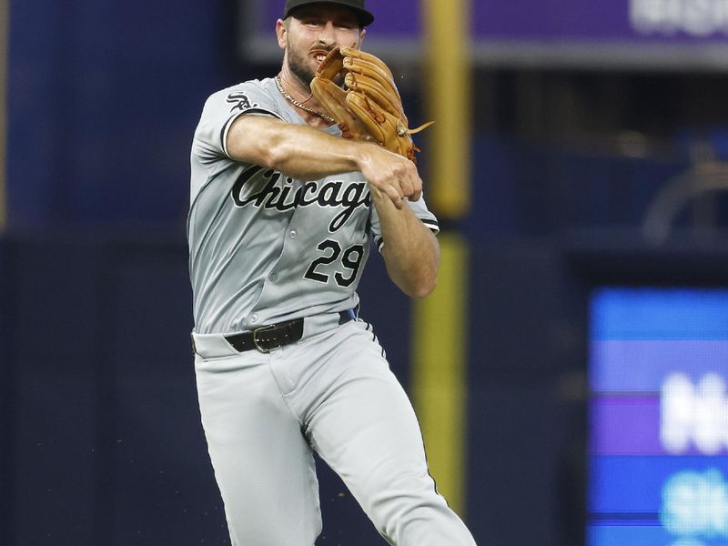 Jul 6, 2024; Miami, Florida, USA;  Chicago White Sox shortstop Paul DeJong (29) throws out Miami Marlins third baseman Jonah Bride (41) to end the second inning at loanDepot Park. Mandatory Credit: Rhona Wise-USA TODAY Sports