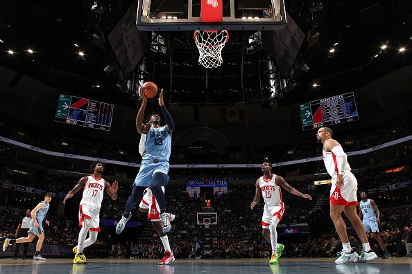 MEMPHIS, TN - DECEMBER 15:  Jaren Jackson Jr. #13 of the Memphis Grizzlies drives to the basket during the game against the Houston Rockets on December 15, 2023 at FedExForum in Memphis, Tennessee. NOTE TO USER: User expressly acknowledges and agrees that, by downloading and or using this photograph, User is consenting to the terms and conditions of the Getty Images License Agreement. Mandatory Copyright Notice: Copyright 2023 NBAE (Photo by Joe Murphy/NBAE via Getty Images)