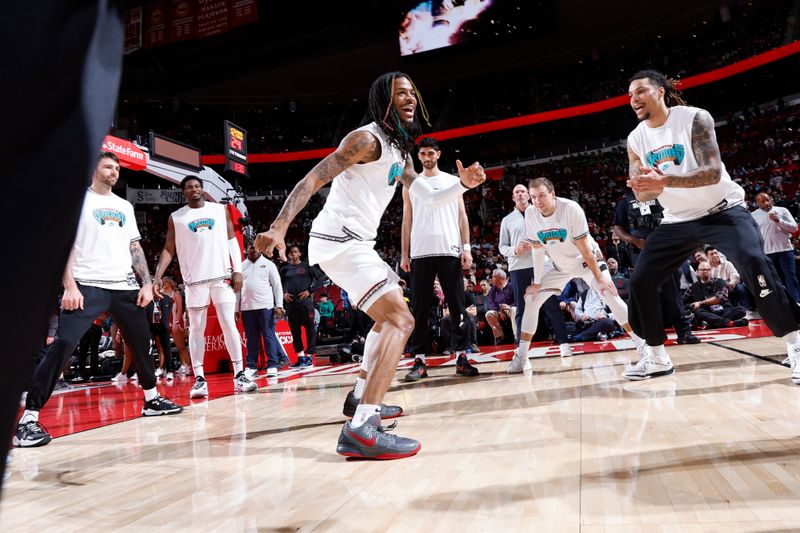 HOUSTON, TX - JANUARY 13:  Ja Morant #12 of the Memphis Grizzlies smiles before the game against the Houston Rockets  on January 13, 2025 at the Toyota Center in Houston, Texas. NOTE TO USER: User expressly acknowledges and agrees that, by downloading and or using this photograph, User is consenting to the terms and conditions of the Getty Images License Agreement. Mandatory Copyright Notice: Copyright 2024 NBAE (Photo by Logan Riely/NBAE via Getty Images)