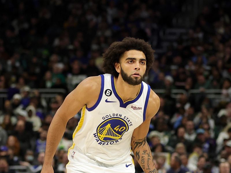 MILWAUKEE, WISCONSIN - DECEMBER 13: Anthony Lamb #40 of the Golden State Warriors handles the ball during a game against the Milwaukee Bucks at Fiserv Forum on December 13, 2022 in Milwaukee, Wisconsin. The Bucks defeated the Warriors 128-111. NOTE TO USER: User expressly acknowledges and agrees that, by downloading and or using this photograph, User is consenting to the terms and conditions of the Getty Images License Agreement. (Photo by Stacy Revere/Getty Images)