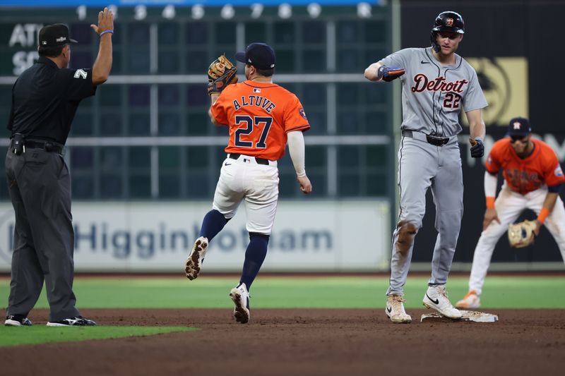 Oct 2, 2024; Houston, Texas, USA; Houston Astros shortstop Jeremy Pena (3) tags  Detroit Tigers catcher Jake Rogers (34) out at second base on a fielders choice during the ninth inning of game two of the Wildcard round for the 2024 MLB Playoffs at Minute Maid Park. Mandatory Credit: Thomas Shea-Imagn Images