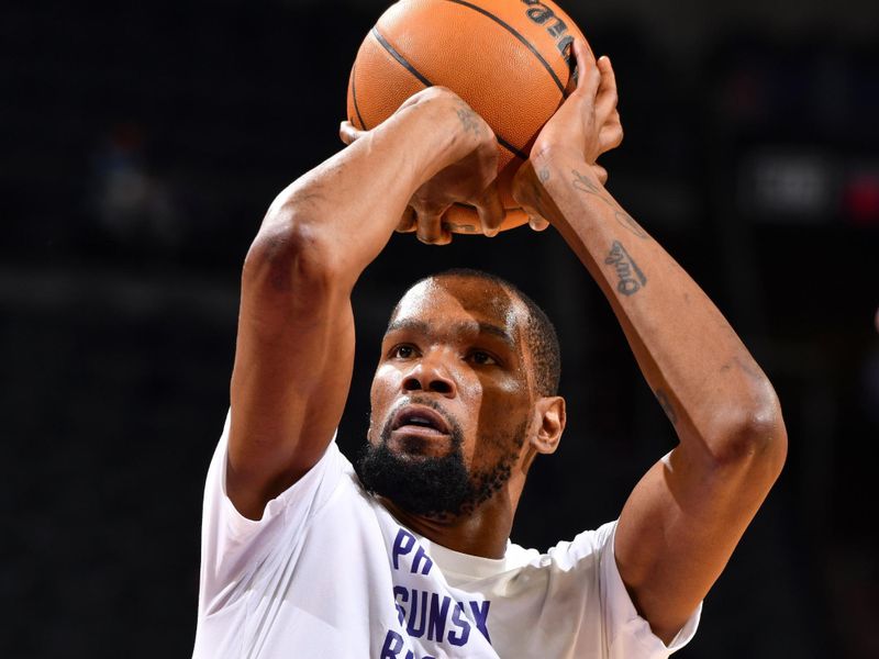 PHOENIX, AZ - MARCH 21:  Kevin Durant #35 of the Phoenix Suns warms-up before the game on March 21, 2024 at Footprint Center in Phoenix, Arizona. NOTE TO USER: User expressly acknowledges and agrees that, by downloading and or using this photograph, user is consenting to the terms and conditions of the Getty Images License Agreement. Mandatory Copyright Notice: Copyright 2024 NBAE (Photo by Barry Gossage/NBAE via Getty Images)