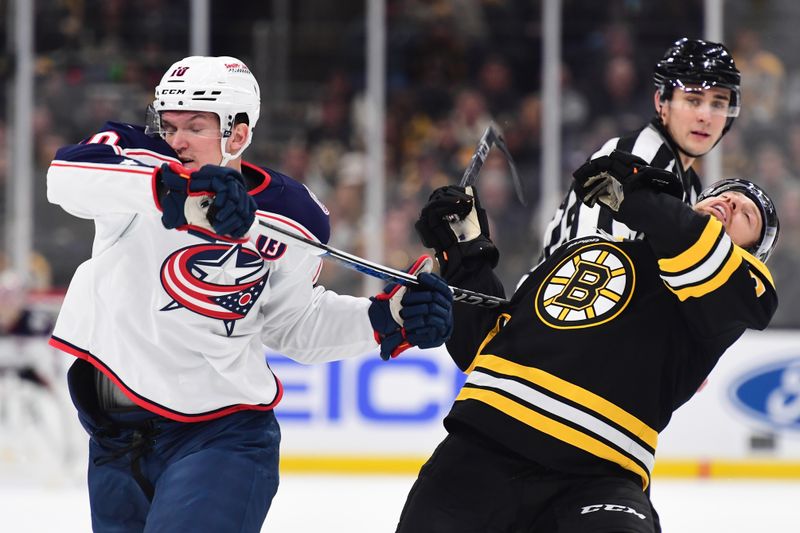 Nov 18, 2024; Boston, Massachusetts, USA;  Columbus Blue Jackets left wing Dmitri Voronkov (10) high sticks Boston Bruins left wing Jeffrey Viel (48) during the second period at TD Garden. Mandatory Credit: Bob DeChiara-Imagn Images