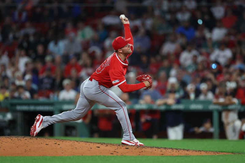 Jun 3, 2025; Boston, Massachusetts, USA; Los Angeles Angels relief pitcher Reid Detmers (48) delivers a pitch during the tenth inning against the Boston Red Sox at Fenway Park. Mandatory Credit: Paul Rutherford-Imagn Images