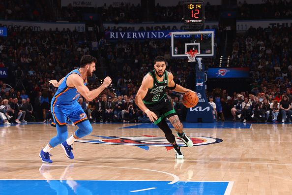 OKLAHOMA CITY, OK - JANUARY 2: Jayson Tatum #0 of the Boston Celtics drives to the basket during the game against the Oklahoma City Thunder on January 2, 2024 at Paycom Arena in Oklahoma City, Oklahoma. NOTE TO USER: User expressly acknowledges and agrees that, by downloading and or using this photograph, User is consenting to the terms and conditions of the Getty Images License Agreement. Mandatory Copyright Notice: Copyright 2024 NBAE (Photo by Zach Beeker/NBAE via Getty Images)