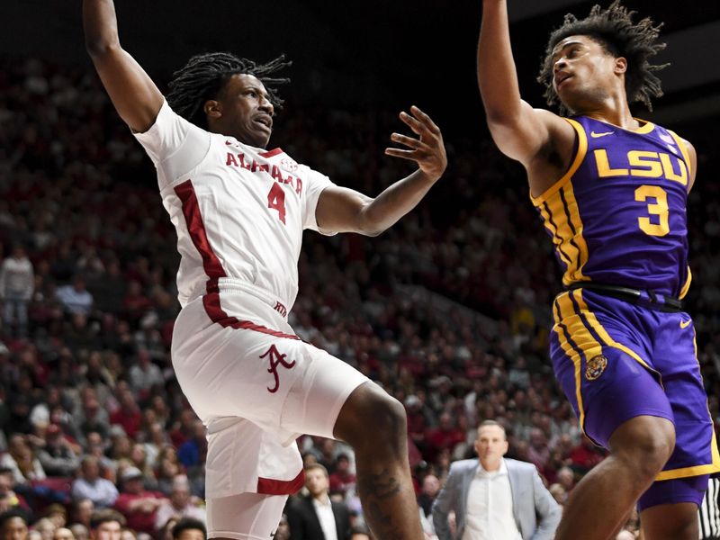 Jan 27, 2024; Tuscaloosa, Alabama, USA; Alabama guard Davin Cosby Jr. (4) gets an offensive rebound over LSU guard Jalen Cook (3) at Coleman Coliseum. Mandatory Credit: Gary Cosby Jr.-USA TODAY Sports