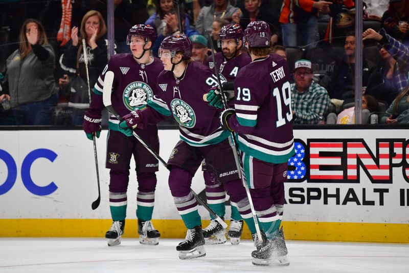 Apr 5, 2024; Anaheim, California, USA; Anaheim Ducks celebrate the goal scored by center Leo Carlsson (91) against the Seattle Kraken during the second period at Honda Center. Mandatory Credit: Gary A. Vasquez-USA TODAY Sports