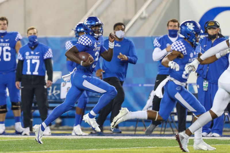 Oct 10, 2020; Lexington, Kentucky, USA; Kentucky Wildcats quarterback Terry Wilson (3) runs with the ball against the Mississippi State Bulldogs in the first half at Kroger Field. Mandatory Credit: Katie Stratman-USA TODAY Sports