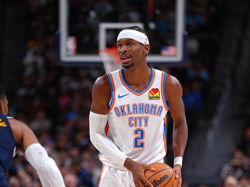 DENVER, CO - NOVEMBER 6: Shai Gilgeous-Alexander #2 of the Oklahoma City Thunder handles the ball during the game against the Denver Nuggets on November 6, 2024 at Ball Arena in Denver, Colorado. NOTE TO USER: User expressly acknowledges and agrees that, by downloading and/or using this Photograph, user is consenting to the terms and conditions of the Getty Images License Agreement. Mandatory Copyright Notice: Copyright 2024 NBAE (Photo by Garrett Ellwood/NBAE via Getty Images)