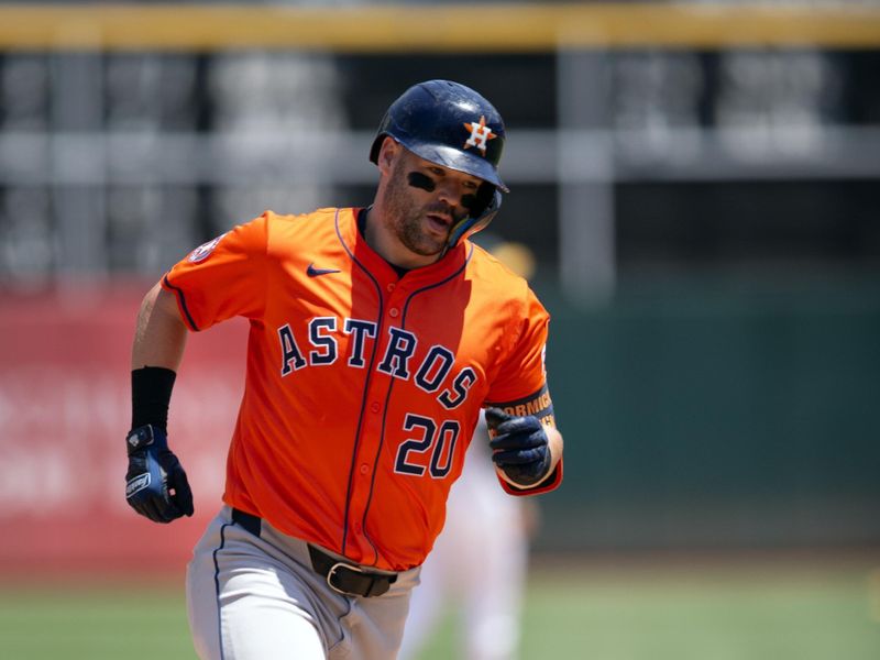 Jul 24, 2024; Oakland, California, USA; Houston Astros right fielder Chas McCormick (20) runs the bases after hitting a solo home run against the Oakland Athletics during the fifth inning at Oakland-Alameda County Coliseum. Mandatory Credit: D. Ross Cameron-USA TODAY Sports