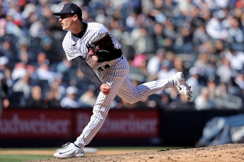 Apr 2, 2023; Bronx, New York, USA; New York Yankees relief pitcher Ron Marinaccio (97) follows through on a pitch against the San Francisco Giants during the seventh inning at Yankee Stadium. Mandatory Credit: Brad Penner-USA TODAY Sports