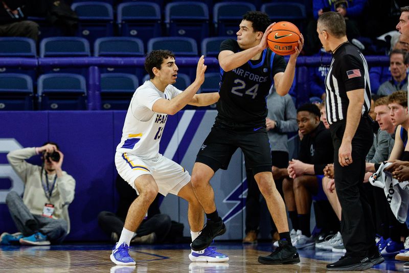 Jan 13, 2024; Colorado Springs, Colorado, USA; Air Force Falcons guard Jeffrey Mills (24) controls the ball as San Jose State Spartans guard Alvaro Cardenas (13) guards in the second half at Clune Arena. Mandatory Credit: Isaiah J. Downing-USA TODAY Sports