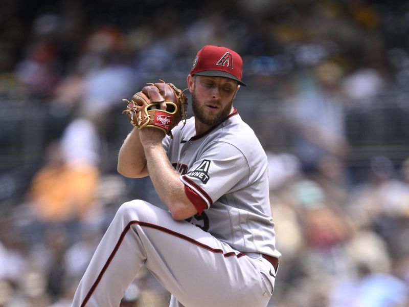 Aug 19, 2023; San Diego, California, USA; Arizona Diamondbacks starting pitcher Merrill Kelly (29) throws a pitch against the San Diego Padres during the first inning at Petco Park. Mandatory Credit: Orlando Ramirez-USA TODAY Sports