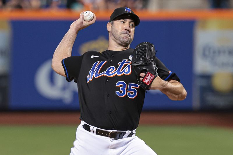 Jun 2, 2023; New York City, New York, USA; New York Mets starting pitcher Justin Verlander (35) delivers a pitch during the first inning against the Toronto Blue Jays at Citi Field. Mandatory Credit: Vincent Carchietta-USA TODAY Sports