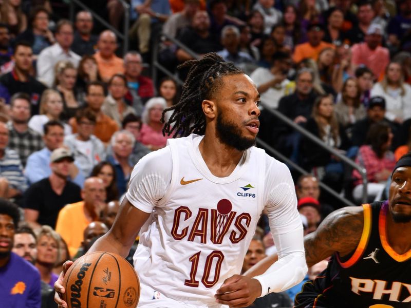 PHOENIX, AZ - APRIL 3:  Darius Garland #10 of the Cleveland Cavaliers handles the ball during the game  on April 3, 2024 at Footprint Center in Phoenix, Arizona. NOTE TO USER: User expressly acknowledges and agrees that, by downloading and or using this photograph, user is consenting to the terms and conditions of the Getty Images License Agreement. Mandatory Copyright Notice: Copyright 2024 NBAE (Photo by Barry Gossage/NBAE via Getty Images)