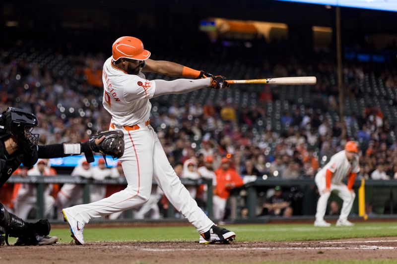 Sep 3, 2024; San Francisco, California, USA;  San Francisco Giants designated hitter Jerar Encarnacion (59) hits an RBI single against the Arizona Diamondbacks during the eighth inning at Oracle Park. Mandatory Credit: John Hefti-Imagn Images