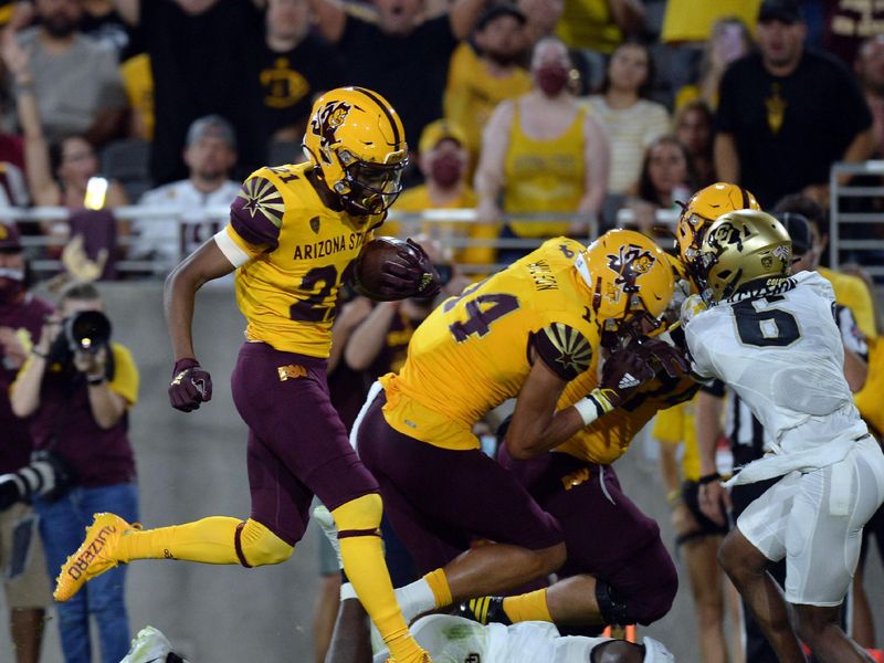 Sep 25, 2021; Tempe, Arizona, USA; Arizona State Sun Devils wide receiver Elijhah Badger (21) runs for a touchdown against the Colorado Buffaloes during the second half at Sun Devil Stadium. Mandatory Credit: Joe Camporeale-USA TODAY Sports