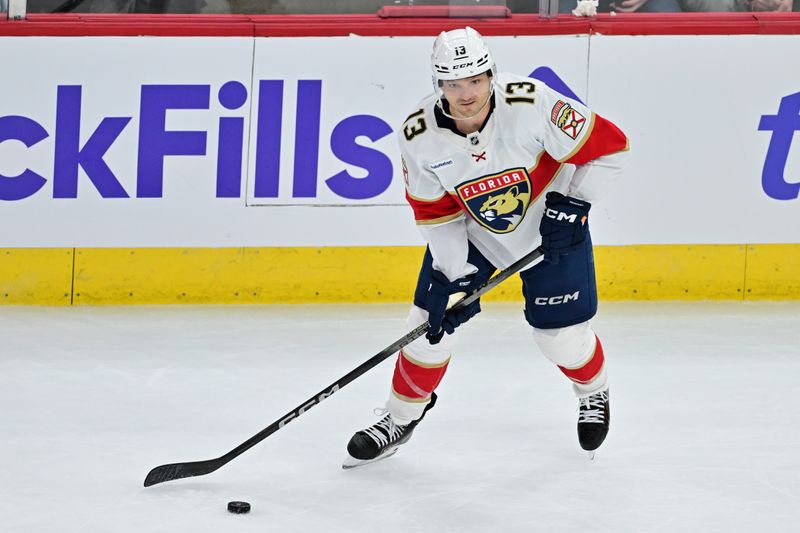 Nov 21, 2024; Chicago, Illinois, USA; Florida Panthers center Sam Reinhart (13) skates with the puck against the Chicago Blackhawks during the third period at the United Center. Mandatory Credit: Daniel Bartel-Imagn Images