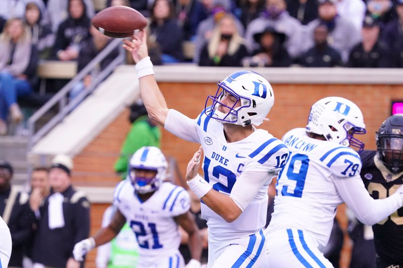 Oct 30, 2021; Winston-Salem, North Carolina, USA;  Duke Blue Devils quarterback Gunnar Holmberg (12) throws the ball during the first half against the Wake Forest Demon Deacons at Truist Field. Mandatory Credit: James Guillory-USA TODAY Sports