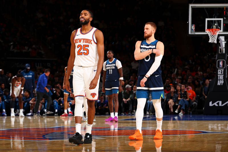 NEW YORK, NY - OCTOBER 13: Mikal Bridges #25 of the New York Knicks and Donte DiVincenzo #0 of the Minnesota Timberwolves look on during the game on October 13, 2024 at Madison Square Garden in New York City, New York.  NOTE TO USER: User expressly acknowledges and agrees that, by downloading and or using this photograph, User is consenting to the terms and conditions of the Getty Images License Agreement. Mandatory Copyright Notice: Copyright 2024 NBAE  (Photo by David L. Nemec/NBAE via Getty Images)