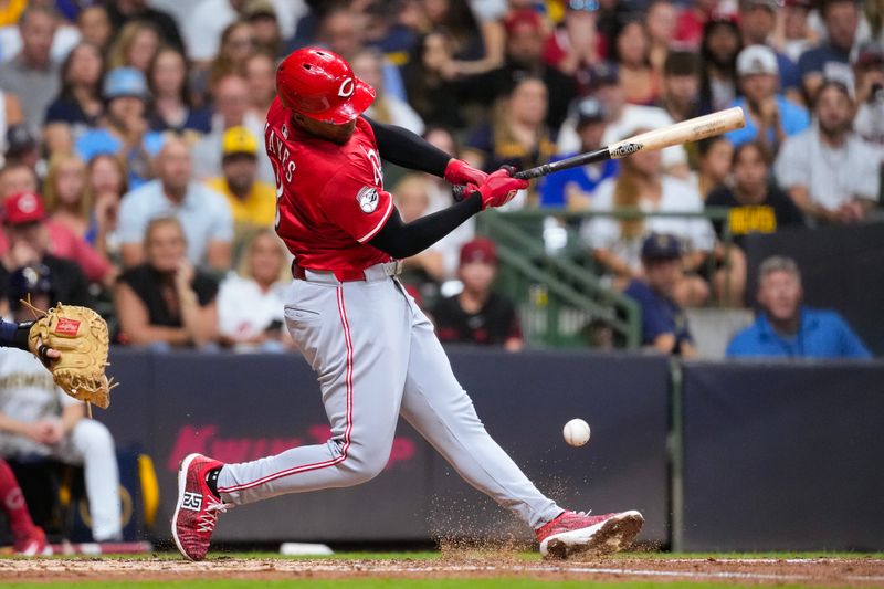 Sep 27, 2025; Milwaukee, Wisconsin, USA;  Cincinnati Reds third baseman Ke'Bryan Hayes (3) hits an RBI single during the third inning against the Milwaukee Brewers at American Family Field. Mandatory Credit: Jeff Hanisch-Imagn Images