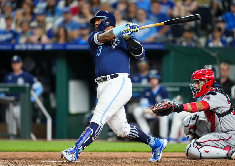 May 26, 2023; Kansas City, Missouri, USA; Kansas City Royals designated hitter Salvador Perez (13) hits an RBI double during the seventh inning against the Washington Nationals at Kauffman Stadium. Mandatory Credit: Jay Biggerstaff-USA TODAY Sports