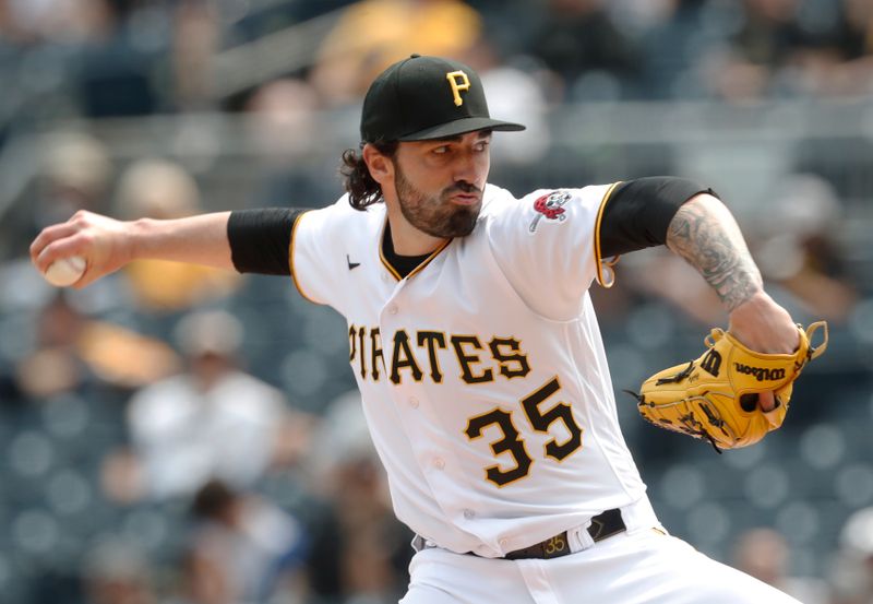 May 10, 2023; Pittsburgh, Pennsylvania, USA;  Pittsburgh Pirates relief pitcher Colin Holderman (35) pitches against the Colorado Rockies during the eighth inning at PNC Park. Colorado won 4-3. Mandatory Credit: Charles LeClaire-USA TODAY Sports