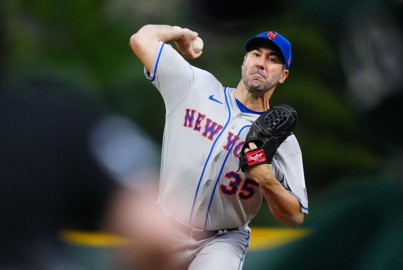 May 27, 2023; Denver, Colorado, USA; New York Mets starting pitcher Justin Verlander (35) delivers against the Colorado Rockies in the first inning at Coors Field. Mandatory Credit: Ron Chenoy-USA TODAY Sports