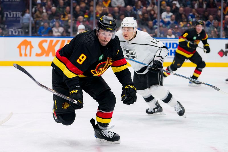 Feb 29, 2024; Vancouver, British Columbia, CAN; Vancouver Canucks forward J.T. Miller (9) skates after the loose puck against the Los Angeles Kings in the third period at Rogers Arena. Kings won 5-1. Mandatory Credit: Bob Frid-USA TODAY Sports